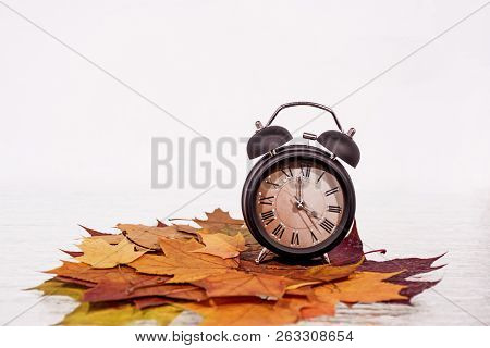 Daylight Saving Time. Wall Clock Going To Winter Time. Autumn Abstraction.