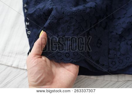 Kharkov, Ukraine- September 12, 2018: Navy Guipure Fabric In A Female Hand. Details, Close-up. Fashi