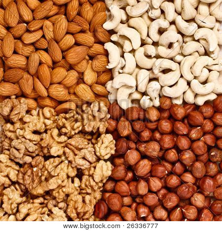 Lähikuva erilaisia pähkinöitä (almons, cashew, saksanpähkinää ja filbers)