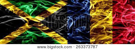 Jamaica Vs Chad, Chadian Smoke Flags Placed Side By Side. Thick Colored Silky Smoke Flags Of Jamaica