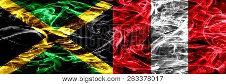 Jamaica Vs Peru, Peruan Smoke Flags Placed Side By Side. Thick Colored Silky Smoke Flags Of Jamaican