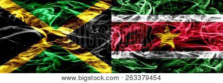 Jamaica Vs Suriname, Surinamese Smoke Flags Placed Side By Side. Thick Colored Silky Smoke Flags Of 