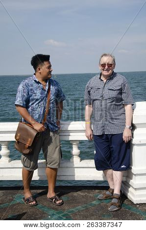 Thai People And Foreigner Travelers Visit Travel And Posing For Take Photo At View Point In Chonburi