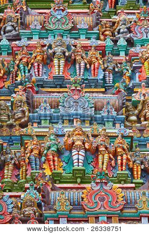 Sculptures on Hindu temple gopura (tower). Menakshi Temple, Madurai, Tamil Nadu, India