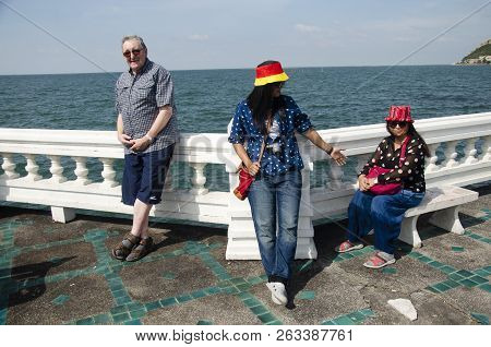 Thai People And Foreigner Travelers Visit Travel And Posing For Take Photo At Laem Thaen Cape In Cho
