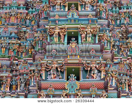 Sculptures on Hindu temple gopura (tower). Menakshi Temple, Madurai, Tamil Nadu, India