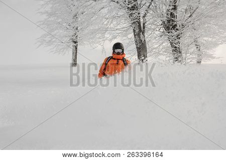 Man Riding Down The Snowboard On The Powdered Snow In The Mountain Popular Tourist Resort In Goderzi