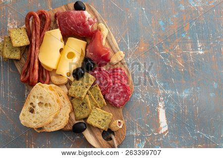 Platter With Spanish Ham Jamon Or Italian Prosciutto Crudo, Sliced Italian Hard Cheese. Homemade Dri