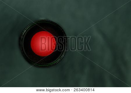 A Photo Of A Vibrant Red Button, Shot From Above, A Kill Switch On A Dark Panel With Copy Space