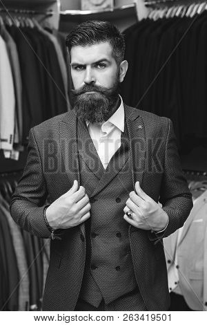 Handsome Young Brunette Bearded Model, Wearing In Black And White Suit, Looking With Attitude, Posin