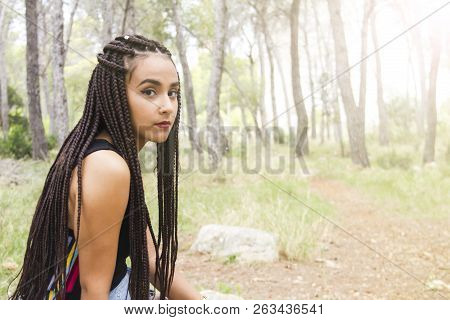 Young Beautiful Girl With Braided Hair