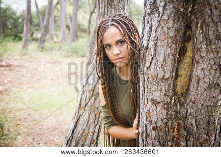 Young And Beautiful Girl With Braided Hair