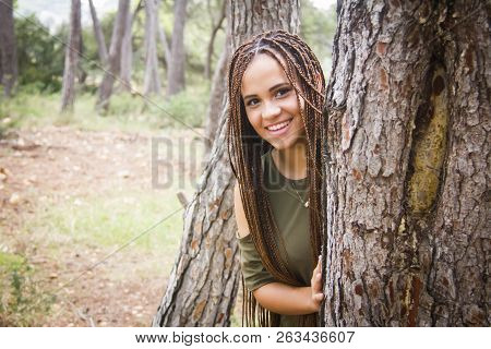 Young And Beautiful Girl With Braided Hair