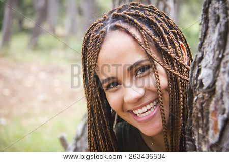 Young And Beautiful Girl With Braided Hair