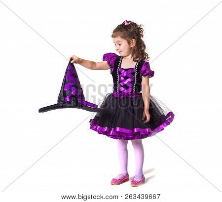 Young Woman With Red Hair As Evil Witch Isolated Over White Background