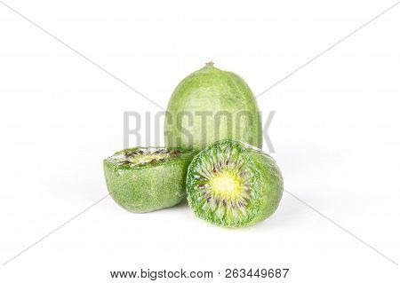 Group Of One Whole Two Halves Of Fresh Green Mini Baby Kiwi Fruit Isolated On White Background