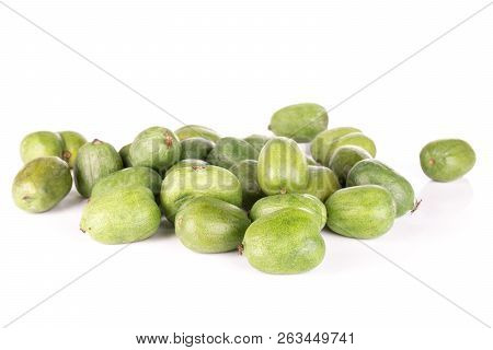 Lot Of Whole Fuzzless Fresh Green Mini Baby Kiwi Fruit Isolated On White Background