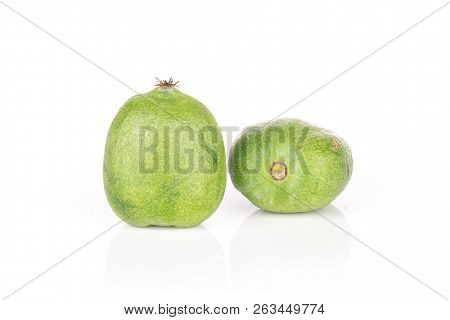 Group Of Two Whole Ripe Fresh Green Mini Baby Kiwi Fruit Isolated On White Background