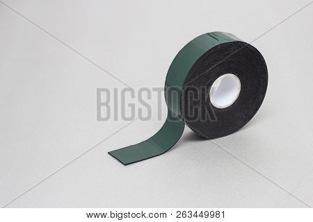 Reel Of Double-sided Tape On A Silver Background, Close-up, Scotch Tape, Scotch