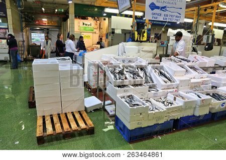London, Uk - July 8, 2016: Vendors Sell Sea Food At Billingsgate Fish Market In London, Uk. The Mark