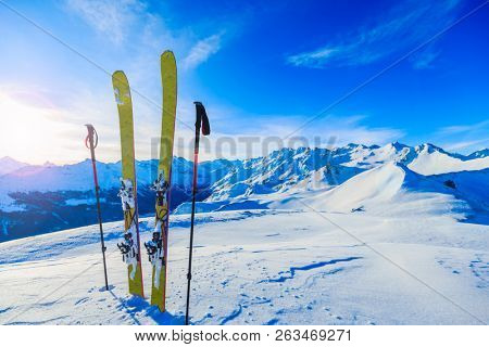 Skitouring with amazing view of swiss famous mountains in beautiful winter powder snow of Alps. 