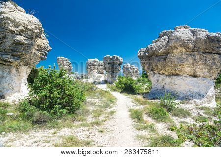Forcalquier Mushroom-shaped Rock Formations In Les Mourres Nature Park In France During A Sunny Day