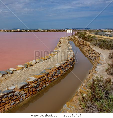 Pink Salt Pool In Saltmine And Canal In Murcia