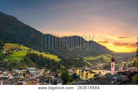 Sunset Over Ortisei St Ulrich Urtijei Village, Dolomites Alps Mountains, Trentino Alto Adige Sud Tyr