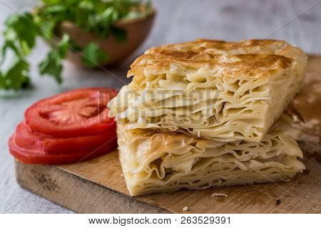 Su Boregi / Turkish Patty With Greens And Tomatoes.