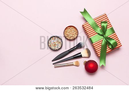 Various Cosmetic Products For Make-up, Blusher, Powder, Brushes, Lipstick, Eyeshadow And Christmas G