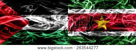 Palestine Vs Suriname, Surinamese Smoke Flags Placed Side By Side. Thick Colored Silky Smoke Flags O