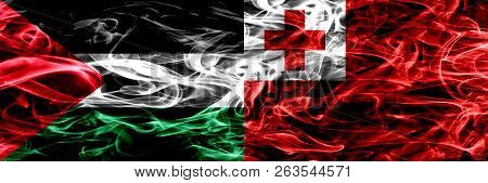 Palestine Vs Tonga, Tongan Smoke Flags Placed Side By Side. Thick Colored Silky Smoke Flags Of Pales