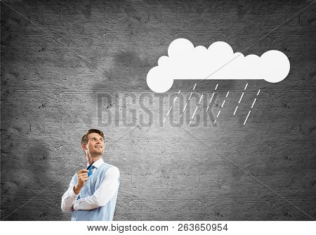 Horizontal Shot Of Confident And Young Businessman In Smart-casual Wear Smoking Pipe While Standing 