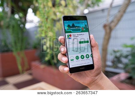 Chiang Mai, Thailand - August 05,2018: Man Holding Huawei With Google Maps On The Screen.google Maps