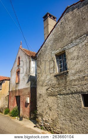 Deserted street on an old village with old rural houses