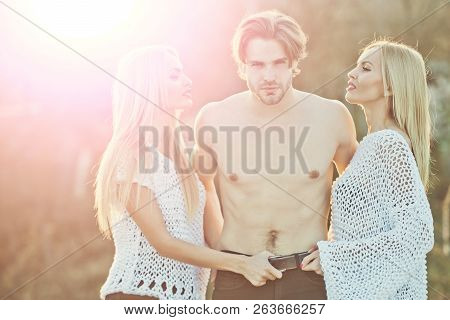 Man With Muscular Body With Twins. Love And Romance. Beauty And Fashion. Blonde And Guy With Athleti