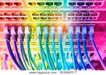 Network cables in switch and firewall in cloud computing data center server rack