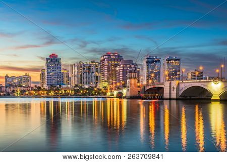 West Palm Beach, Florida, USA skyline on the Intracoastal Waterway at twilight.