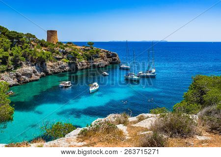 Spain Mallorca Island, Beautiful View Of Bay With Boats And Torre De Cala Pi, Balearic Islands, Medi