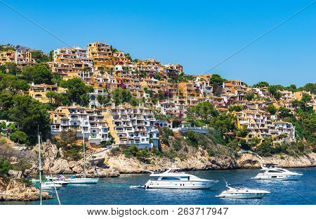 Spain Mediterranean Sea, Colorful Houses At Coast Of Cala Fornells, Mallorca Balearic Islands