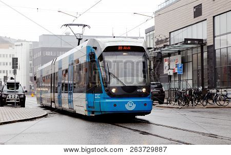Solna, Sweden - April 7, 2014: Modern Tram In The District Of Solna Business Park In Service For The