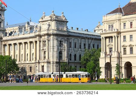 Budapest, Hungary - May 5, 2018: Old Yellow Tram Near Ethnographic Museum On Kossuth Lajos Ter (squa