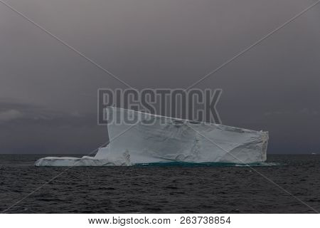 Antarctic Seascape Tabular  With Iceberg