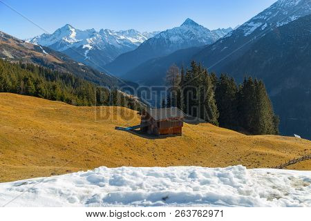 Mountain Landscape. Beautiful Winter Landscape. The Slopes Of The Alps With The Yellow Grass. The To