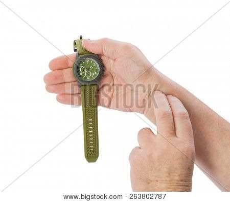 Hand of old man taking pulse isolated on white background