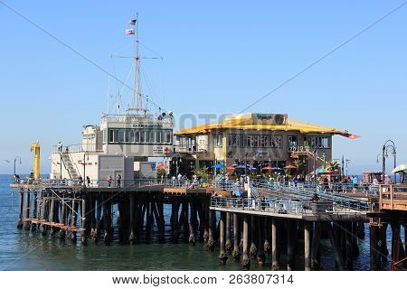 Santa Monica, United States - April 6, 2014: People Visit The Pier In Santa Monica, California. As O