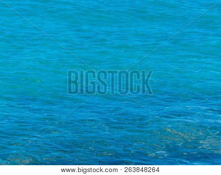 Nature Background Of Transparent, Turquoise Water Of Tyrrenian Sea. Copy Space.