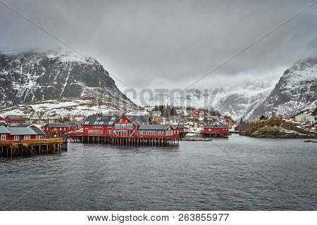 Traditional fishing village A i Lofoten. Lofoten Islands, Norway with red rorbu houses. With snow in winter
