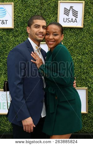 LOS ANGELES - OCT 14:  Rick Gonzalez, Sherry Aon at the CW Network's Fall Launch Event  at the Warner Brothers Studios on October 14, 2018 in Burbank, CA