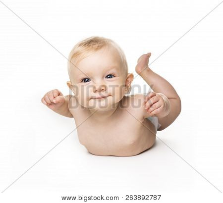 Cute Baby With Beautiful Blue Eyes On The White Flooor